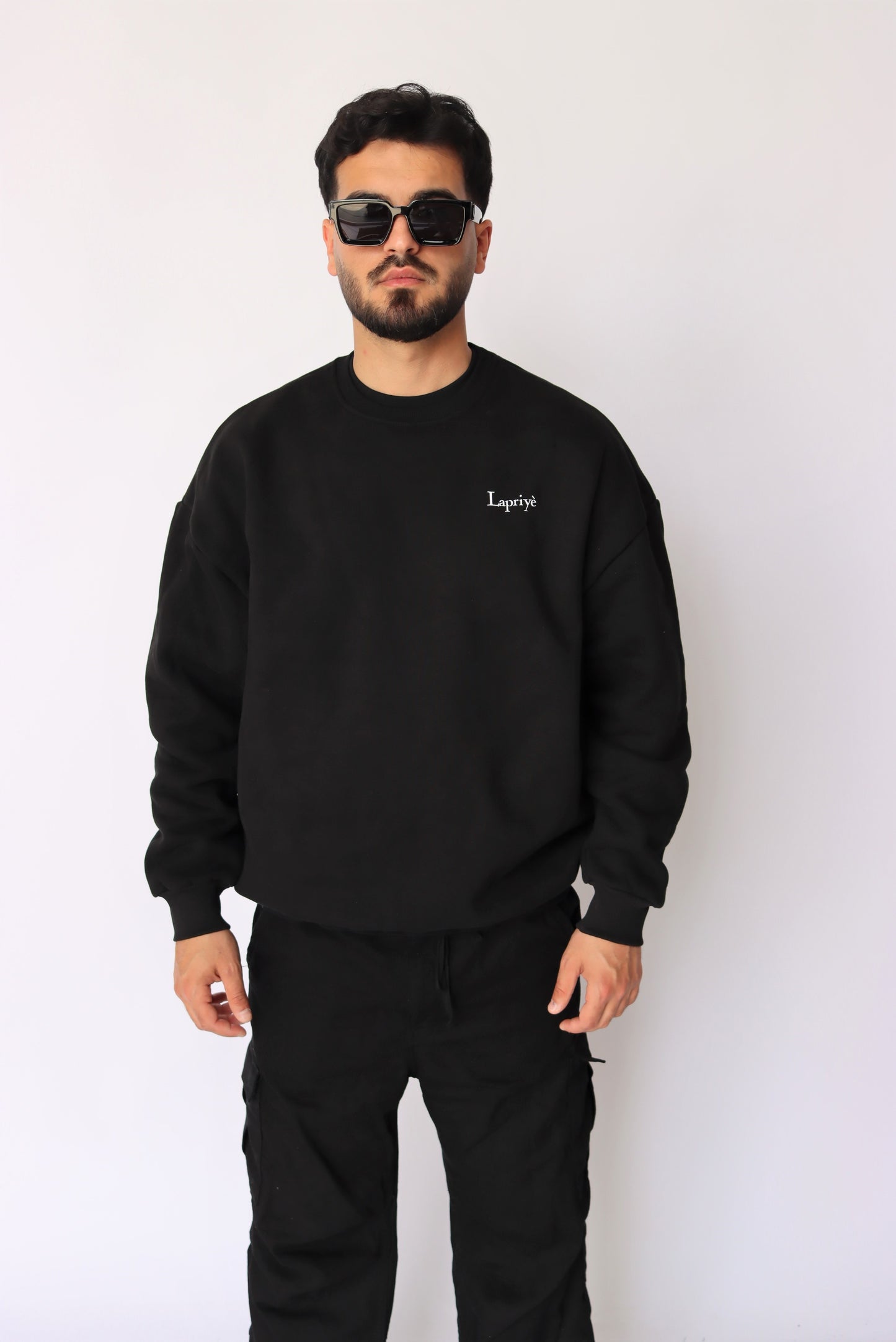 LOYALTY MEANS EVERYTHING OVERSIZED SWEATER IN BLACK