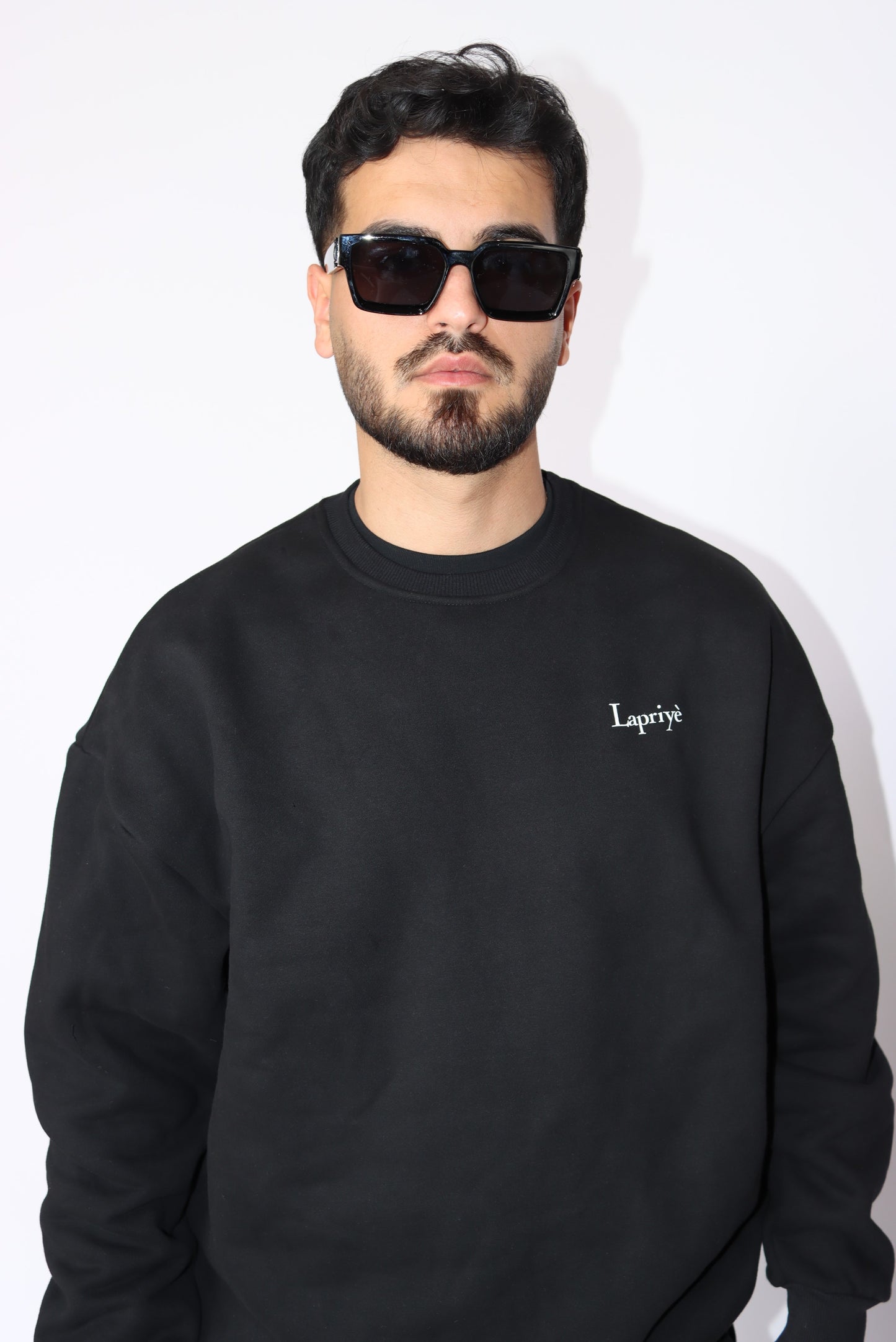 LOYALTY MEANS EVERYTHING OVERSIZED SWEATER IN BLACK