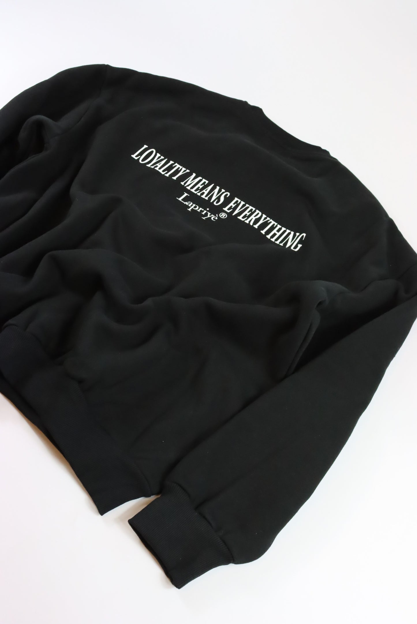 LOYALTY MEANS EVERYTHING OVERSIZED SWEATER IN BLACK